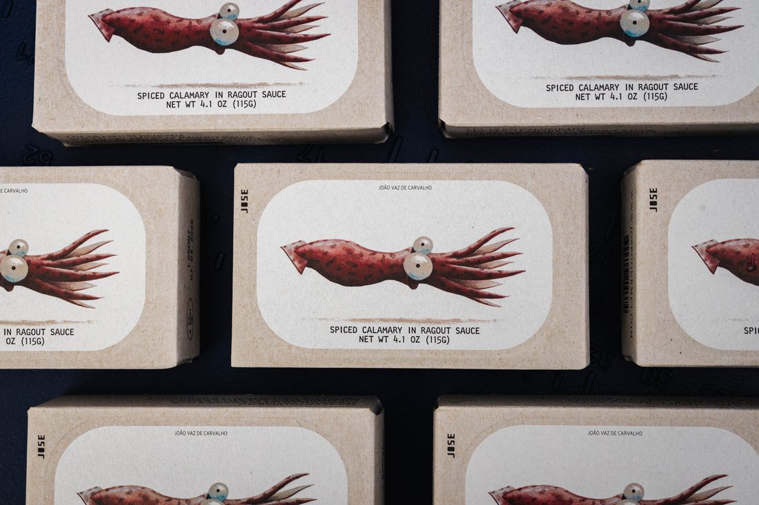 José Gourmet spiced calamary tins arranged in a grid